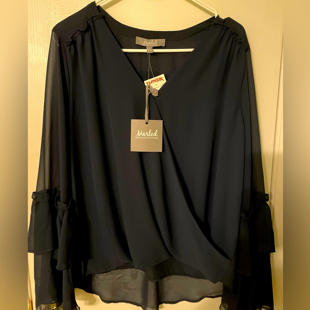 Beautiful navy blue blouse. New. High quality fabric. Semi-sheer arms.